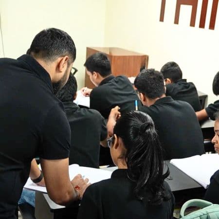 Deepak Sir helping students with their doubts